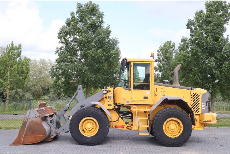 Volvo L70E | BUCKET | QUICK COUPLER | EXTRA FUNCT | AIRCO - Máy xúc lật bánh lốp: hình 1 Volvo L70E | BUCKET | QUICK COUPLER | EXTRA FUNCT | AIRCO - Máy xúc lật bánh lốp: hình 1