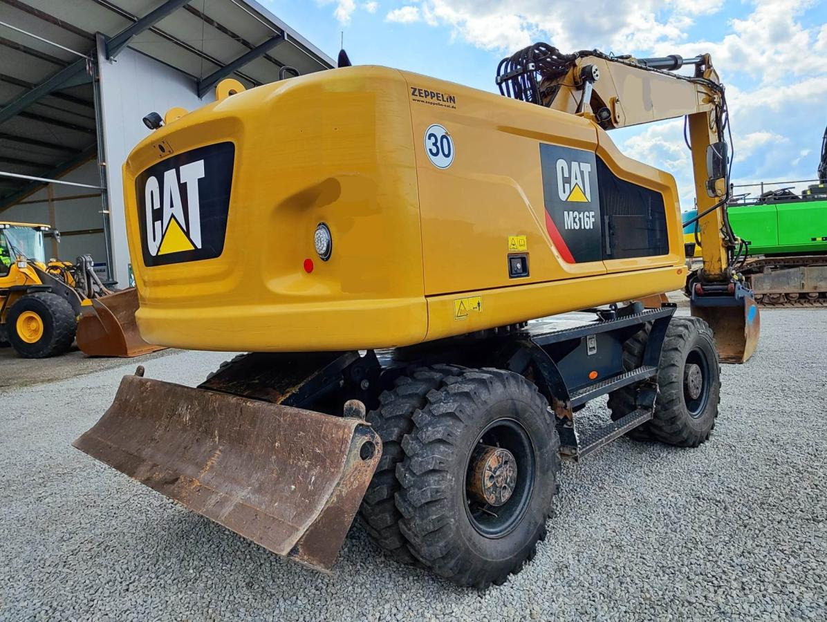 Caterpillar M316F - Máy xúc bánh lốp: hình 4 Caterpillar M316F - Máy xúc bánh lốp: hình 4