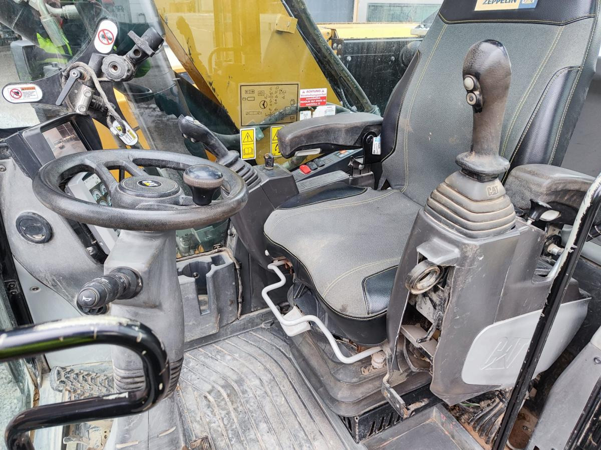 Caterpillar M318F - Máy xúc bánh lốp: hình 4 Caterpillar M318F - Máy xúc bánh lốp: hình 4