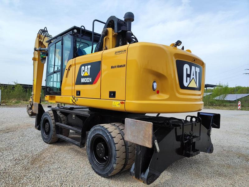 Caterpillar MH3024 EPA zertifiziert - Máy cạp rác/ Công nghiệp: hình 1 Caterpillar MH3024 EPA zertifiziert - Máy cạp rác/ Công nghiệp: hình 1