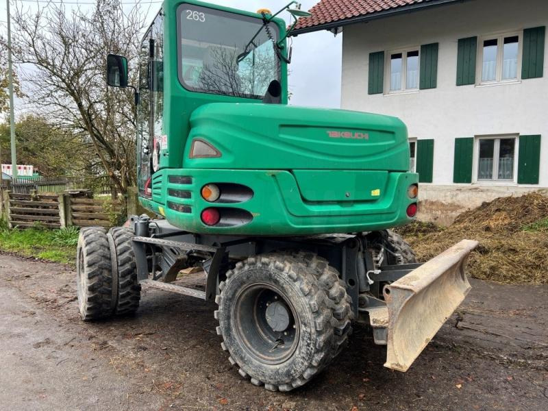 Takeuchi TB295W - Máy xúc bánh lốp: hình 1 Takeuchi TB295W - Máy xúc bánh lốp: hình 1