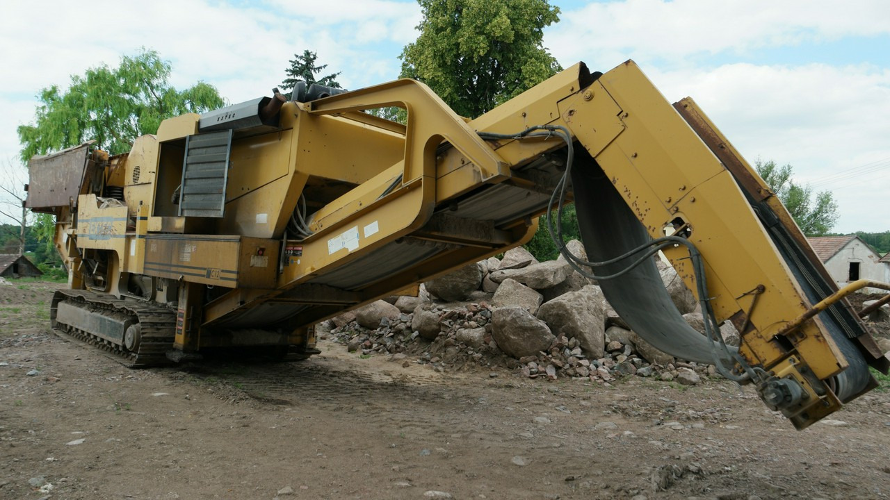 Extec C12+ Masa całkowita 48t - Máy nghiền di động: hình 1 Extec C12+ Masa całkowita 48t - Máy nghiền di động: hình 1