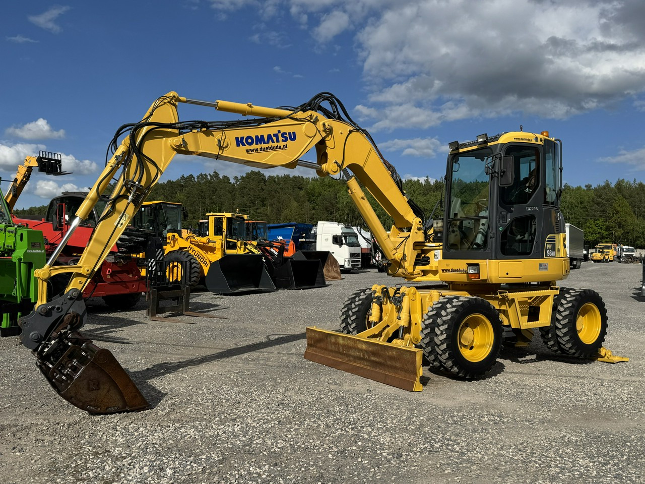 Komatsu PW 98 MR 8 Pług + Podpory 10ton Szybkozłącze - Máy xúc bánh lốp: hình 1 Komatsu PW 98 MR 8 Pług + Podpory 10ton Szybkozłącze - Máy xúc bánh lốp: hình 1