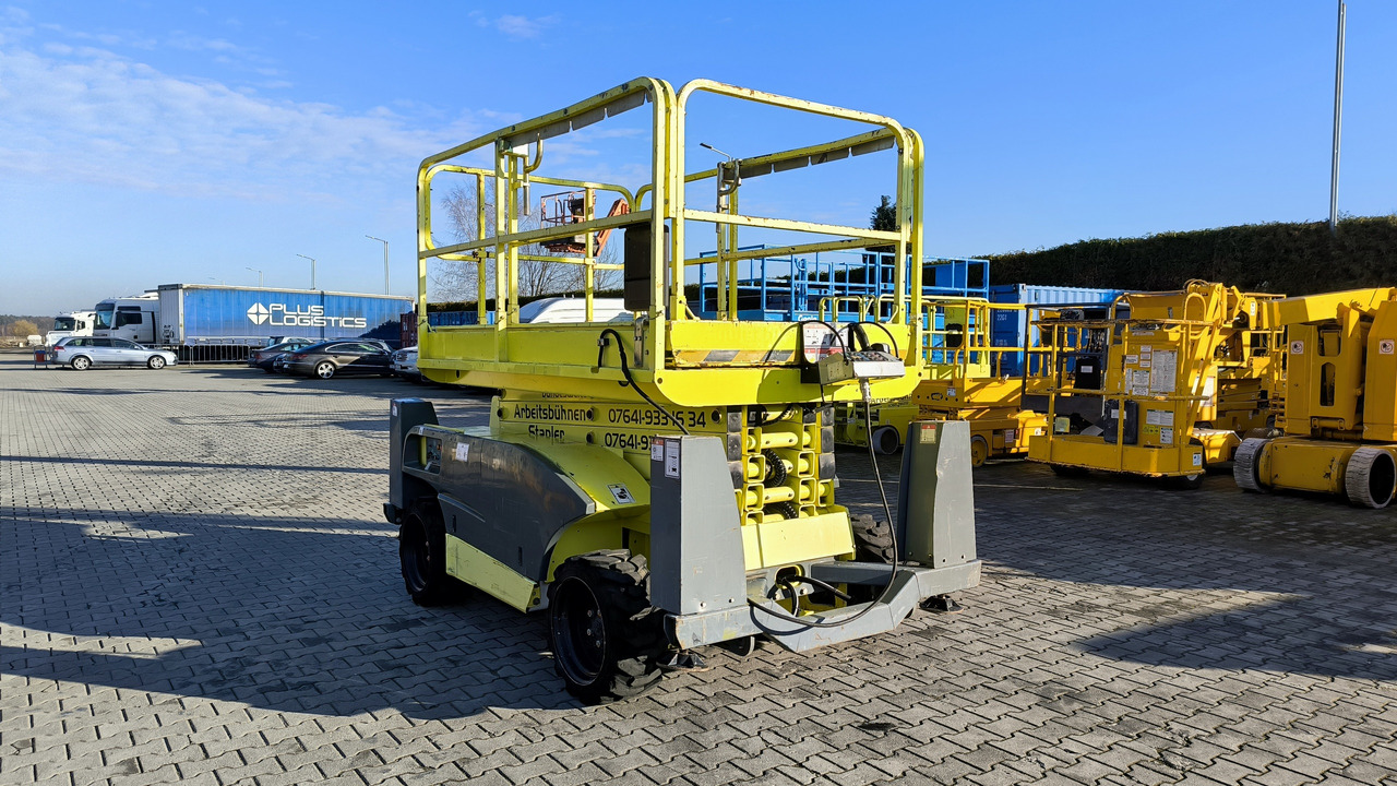 HAULOTTE Compact 12 DX - Máy nâng người hình kéo: hình 1 HAULOTTE Compact 12 DX - Máy nâng người hình kéo: hình 1