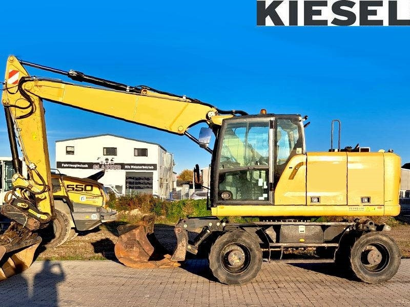 Caterpillar M 318 F - Máy xúc bánh lốp: hình 1 Caterpillar M 318 F - Máy xúc bánh lốp: hình 1