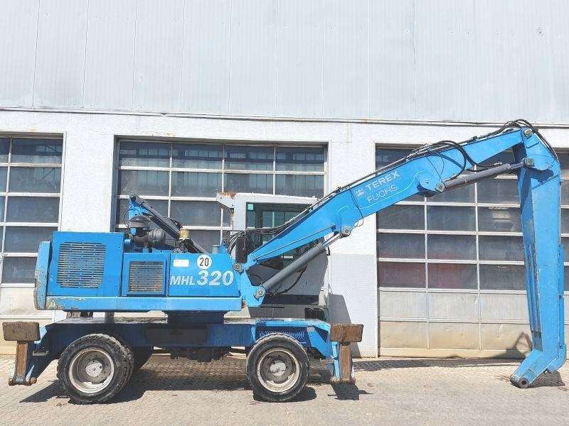 Fuchs MHL 320 - Máy cạp rác/ Công nghiệp: hình 4 Fuchs MHL 320 - Máy cạp rác/ Công nghiệp: hình 4
