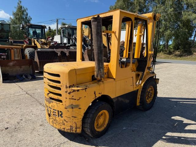 Hyster H 70 C - Xe nhấc hình viễn vọng kính: hình 3 Hyster H 70 C - Xe nhấc hình viễn vọng kính: hình 3