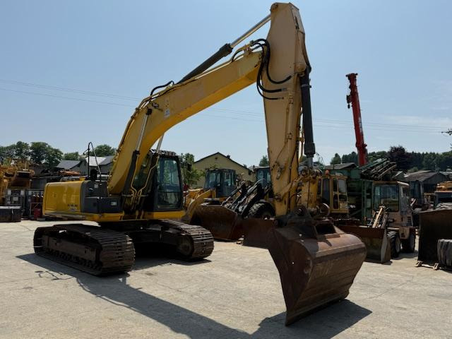 New Holland Kobelco E 215 C - Máy xúc bánh xích: hình 2 New Holland Kobelco E 215 C - Máy xúc bánh xích: hình 2