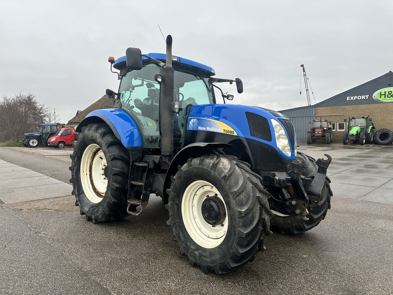 New Holland T6080 - Máy cày: hình 4 New Holland T6080 - Máy cày: hình 4