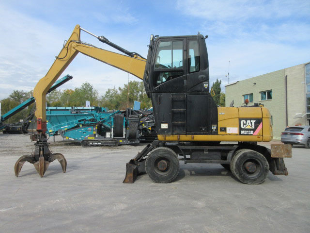 Caterpillar M313D - Máy cạp rác/ Công nghiệp: hình 1 Caterpillar M313D - Máy cạp rác/ Công nghiệp: hình 1