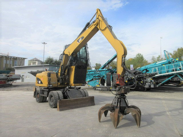 Caterpillar M313D - Máy cạp rác/ Công nghiệp: hình 5 Caterpillar M313D - Máy cạp rác/ Công nghiệp: hình 5