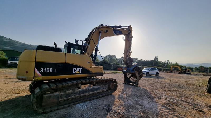 Caterpillar 315DL - Máy xúc bánh xích: hình 5 Caterpillar 315DL - Máy xúc bánh xích: hình 5