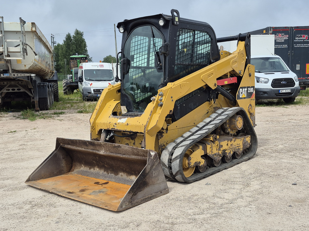 Caterpillar 259D - Máy xúc lật đa năng: hình 1 Caterpillar 259D - Máy xúc lật đa năng: hình 1