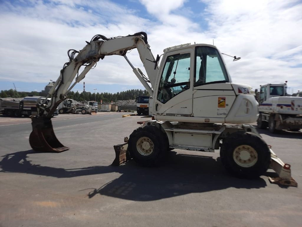 Mecalac 714 MW - Máy xúc bánh lốp: hình 1 Mecalac 714 MW - Máy xúc bánh lốp: hình 1