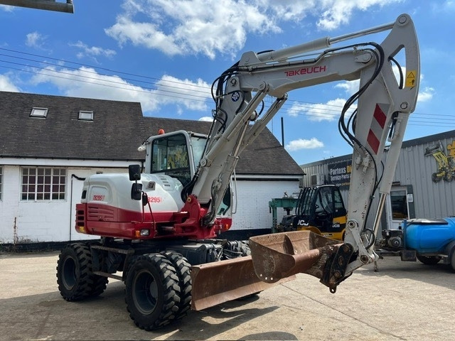 Takeuchi TB295W - Máy xúc bánh lốp: hình 2 Takeuchi TB295W - Máy xúc bánh lốp: hình 2