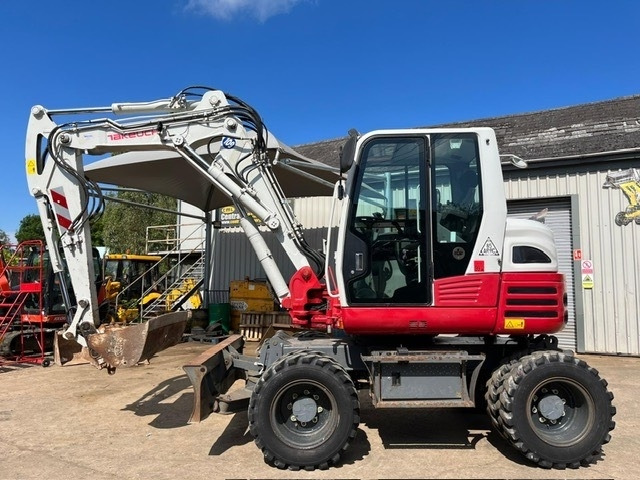 Takeuchi TB295W - Máy xúc bánh lốp: hình 5 Takeuchi TB295W - Máy xúc bánh lốp: hình 5
