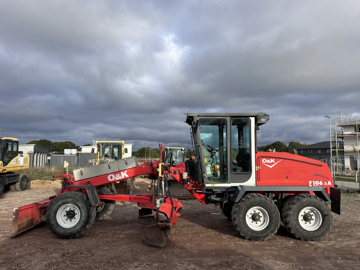 O&K F 106.5 - 6x6 Laser Topcon- Klima Cummins 6 Zyl. - Máy san: hình 1 O&K F 106.5 - 6x6 Laser Topcon- Klima Cummins 6 Zyl. - Máy san: hình 1