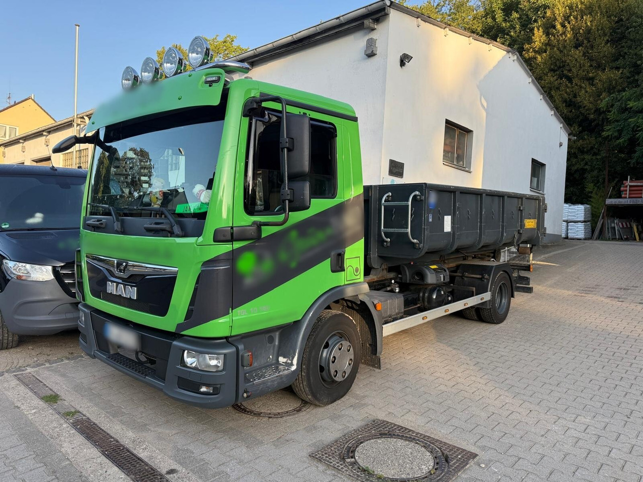 MAN TGL 10.180 4x2 BL TGL 10.180 4x2 BL City-Abrollkipper - Xe tải nâng móc: hình 1 MAN TGL 10.180 4x2 BL TGL 10.180 4x2 BL City-Abrollkipper - Xe tải nâng móc: hình 1