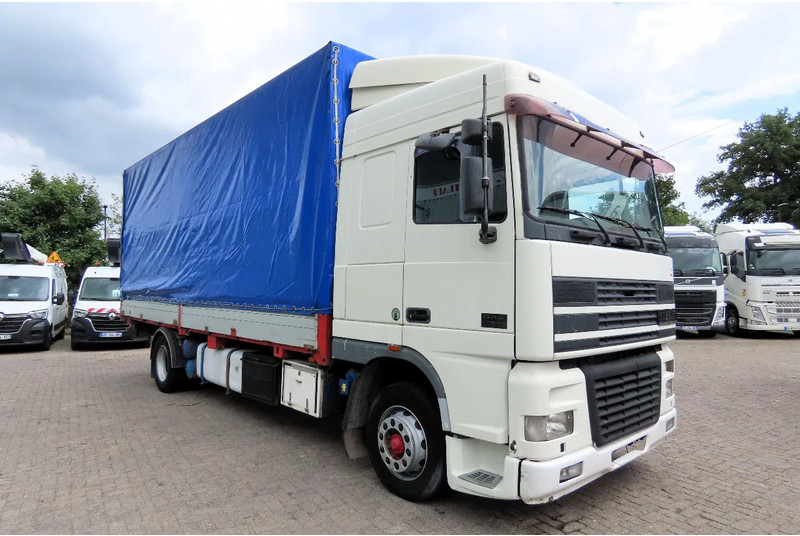 DAF XF 95.430 Manual diesel injection! Manual gearbox! - Xe tải thùng mui bạt: hình 1 DAF XF 95.430 Manual diesel injection! Manual gearbox! - Xe tải thùng mui bạt: hình 1