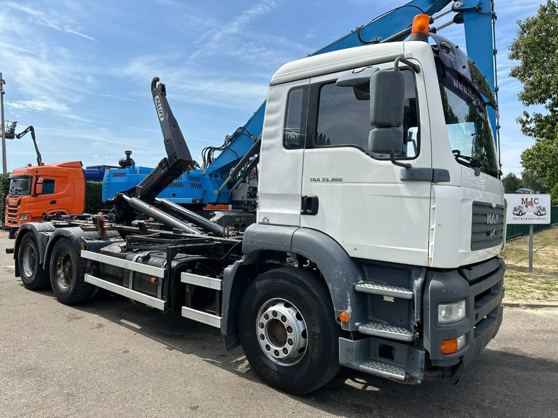 MAN TGA 33.360 6x4 HOOKLIFT - MANUAL ZF - BIG AXLES HUB REDUCTION / STEEL SPRING - BE TRUCK - Xe tải nâng móc: hình 1 MAN TGA 33.360 6x4 HOOKLIFT - MANUAL ZF - BIG AXLES HUB REDUCTION / STEEL SPRING - BE TRUCK - Xe tải nâng móc: hình 1