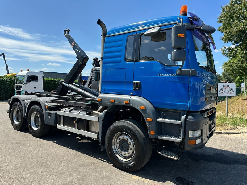 MAN TGA 33.400 6X4 HOOKLIFT AJK NHS20-4930mm - WB 3m60 - MANUAL ZF - STEEL SPRING / BLATT - BIG AXLES / AP ACHSEN - Xe tải nâng móc: hình 1 MAN TGA 33.400 6X4 HOOKLIFT AJK NHS20-4930mm - WB 3m60 - MANUAL ZF - STEEL SPRING / BLATT - BIG AXLES / AP ACHSEN - Xe tải nâng móc: hình 1