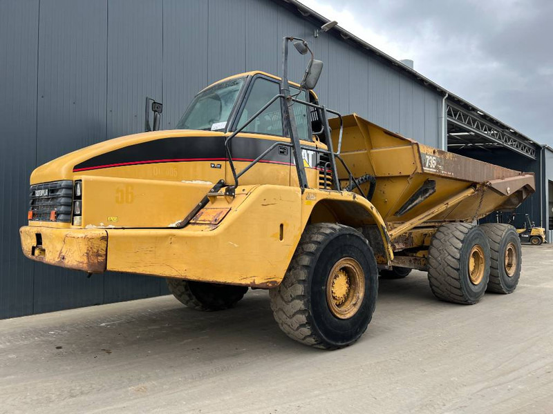 Cat 735 - Xe ben đổ có khớp nối: hình 1 Cat 735 - Xe ben đổ có khớp nối: hình 1