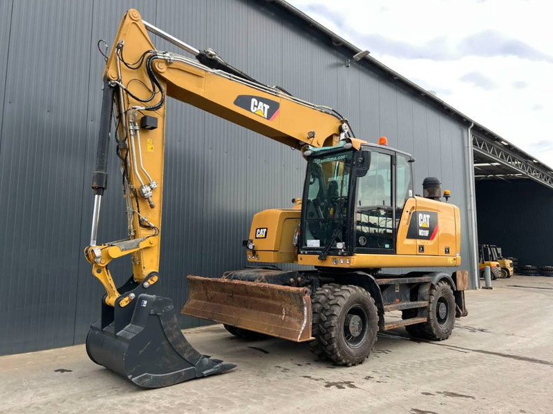 Cat M318F - Máy xúc bánh lốp: hình 1 Cat M318F - Máy xúc bánh lốp: hình 1