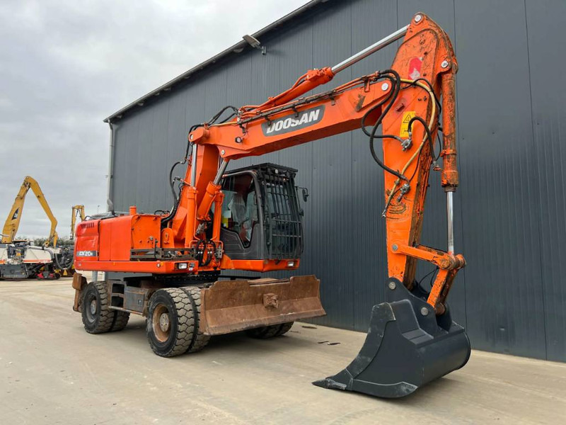 Doosan DX210W - Máy xúc bánh lốp: hình 3 Doosan DX210W - Máy xúc bánh lốp: hình 3