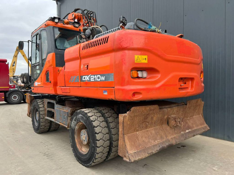 Doosan DX210W - Máy xúc bánh lốp: hình 2 Doosan DX210W - Máy xúc bánh lốp: hình 2