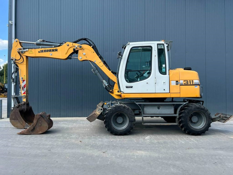 Liebherr A311 Litronic - Máy xúc bánh lốp: hình 5 Liebherr A311 Litronic - Máy xúc bánh lốp: hình 5