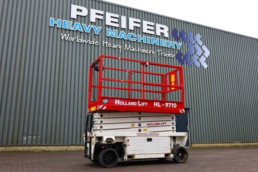 Holland Lift Ecostar HL-9710 Electric, 12m Working Height, 325k - Máy nâng người hình kéo: hình 1 Holland Lift Ecostar HL-9710 Electric, 12m Working Height, 325k - Máy nâng người hình kéo: hình 1