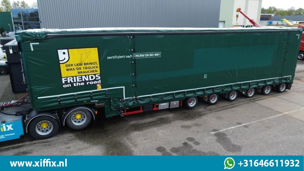 Meusburger 6-ass. Semi dieplader met elektrische huifopbouw / 3x naloop gestuurd - Sơ mi rơ moóc thùng thấp: hình 1 Meusburger 6-ass. Semi dieplader met elektrische huifopbouw / 3x naloop gestuurd - Sơ mi rơ moóc thùng thấp: hình 1