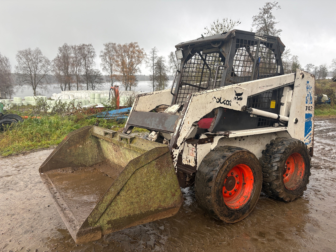 Bobcat - Máy xúc lật bánh lốp: hình 1 Bobcat - Máy xúc lật bánh lốp: hình 1