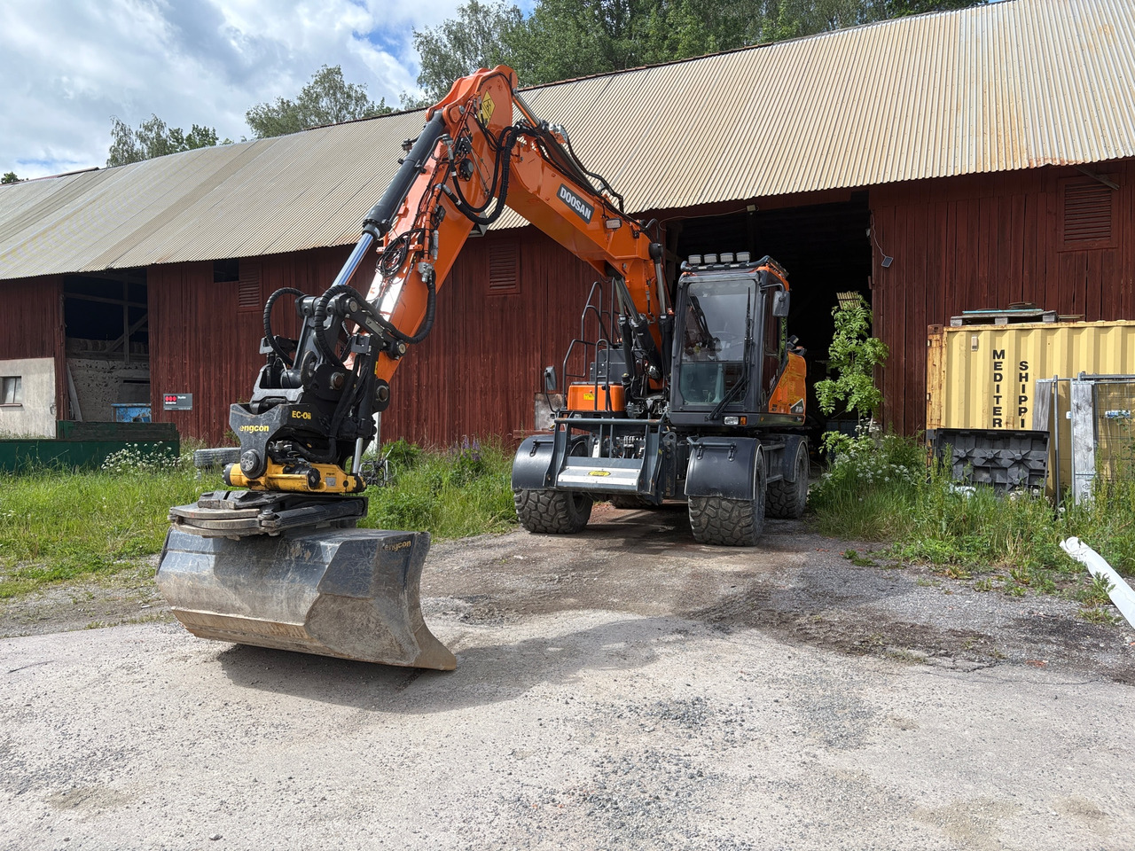 Doosan DX160W-7 - Máy xúc: hình 1 Doosan DX160W-7 - Máy xúc: hình 1