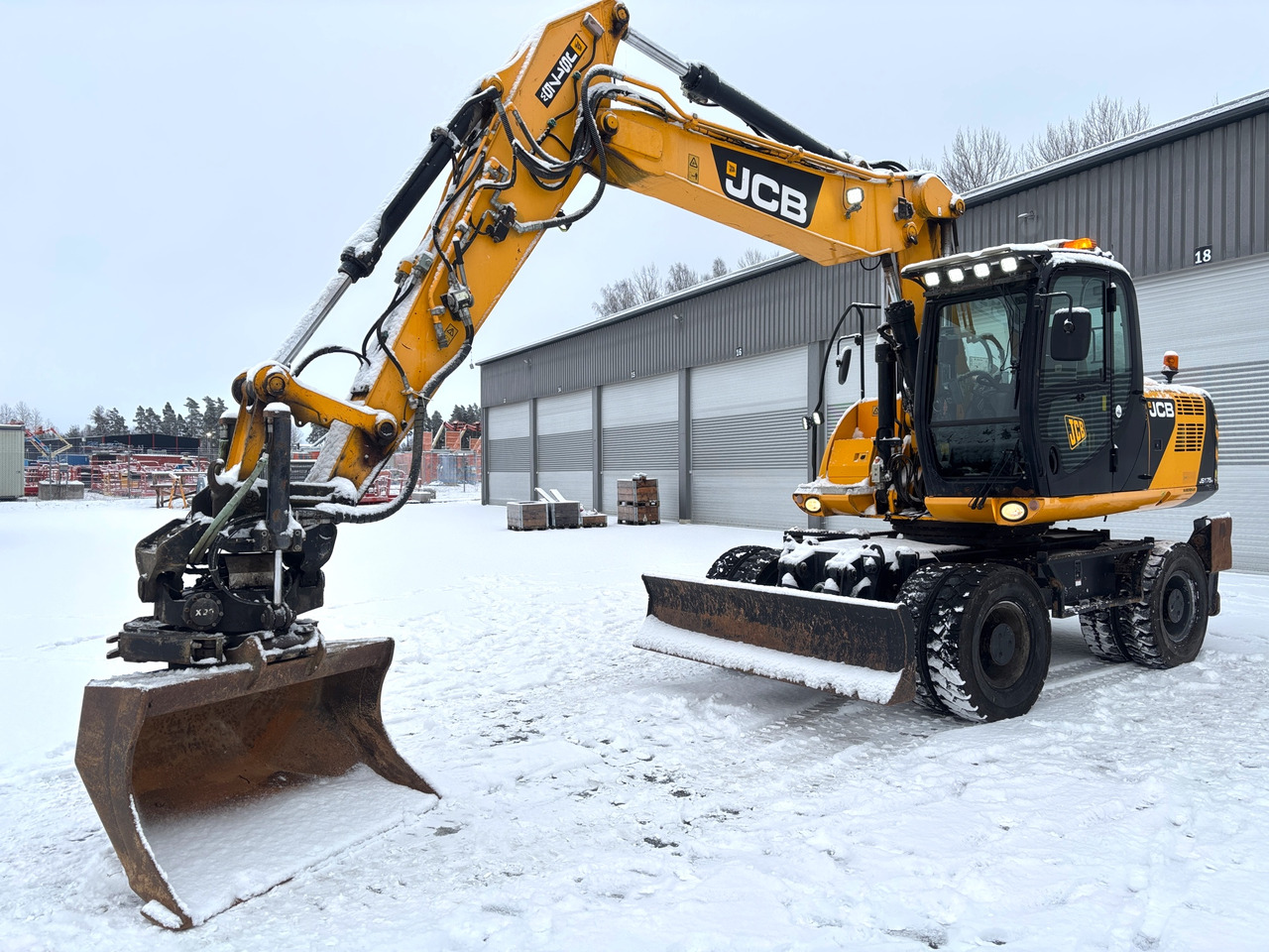 JCB JS175W - Máy xúc: hình 1 JCB JS175W - Máy xúc: hình 1