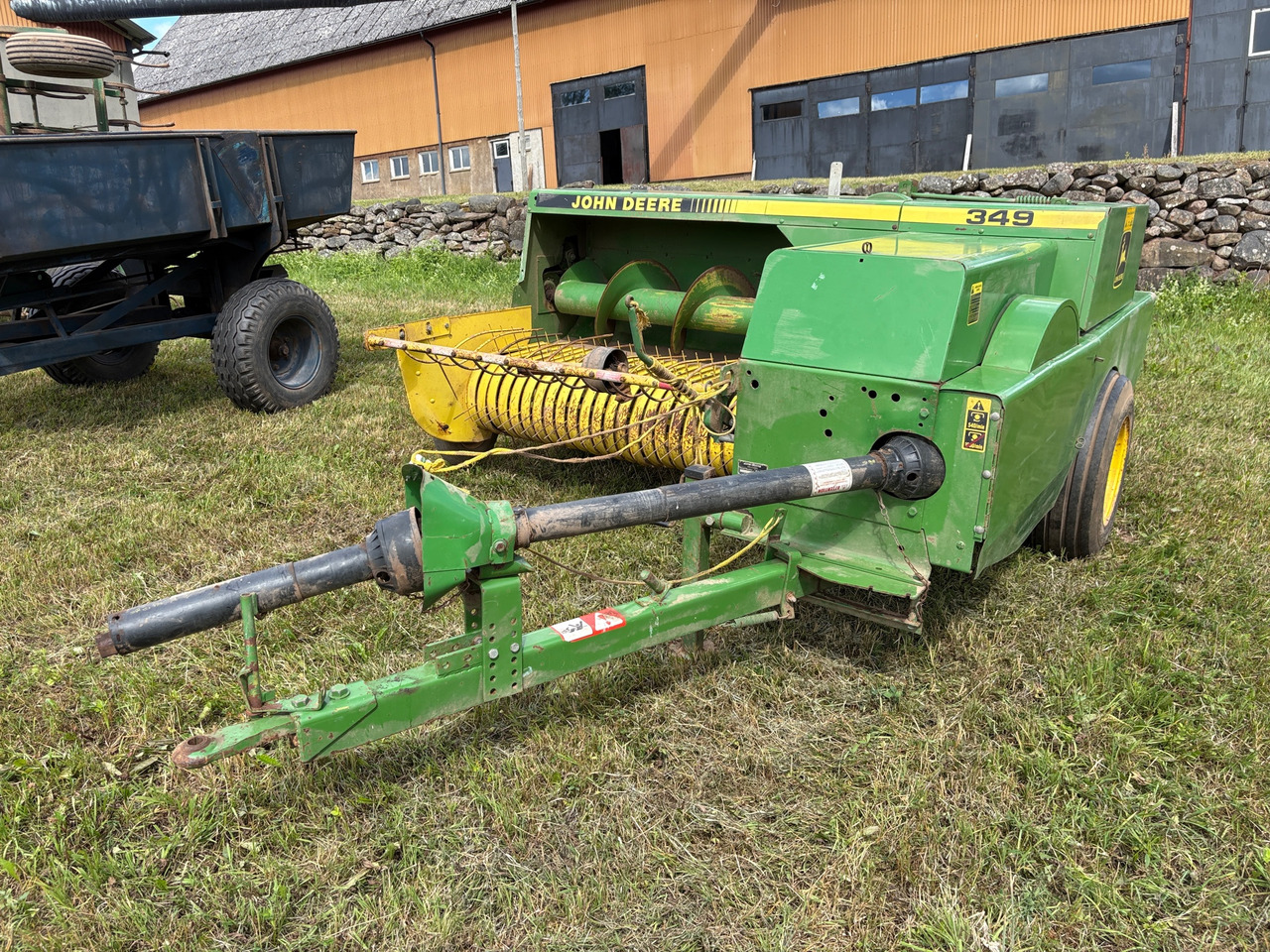 John Deere 349 - Máy đóng kiện tròn: hình 1 John Deere 349 - Máy đóng kiện tròn: hình 1