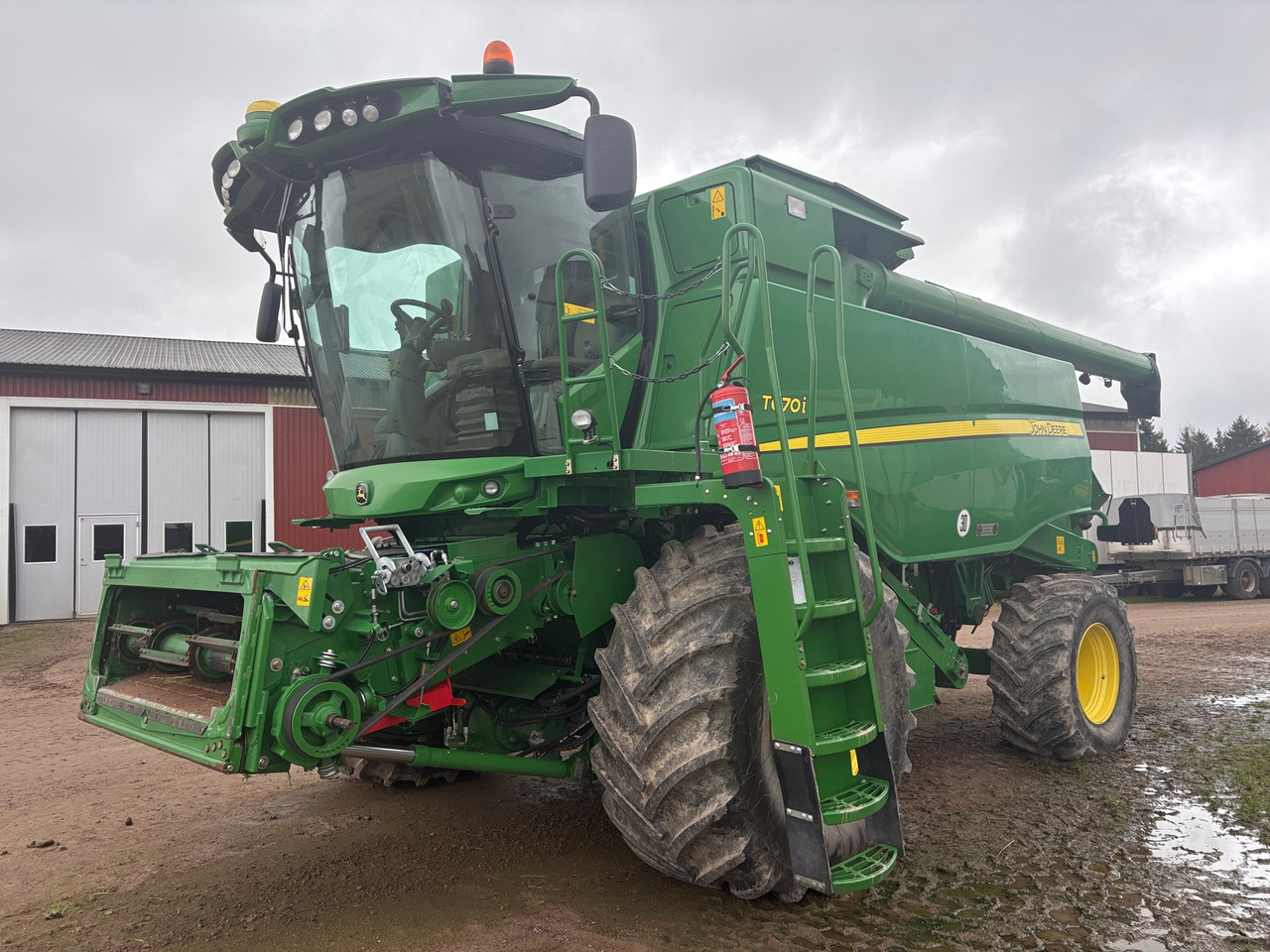 John Deere T670I - Máy gặt đập: hình 1 John Deere T670I - Máy gặt đập: hình 1