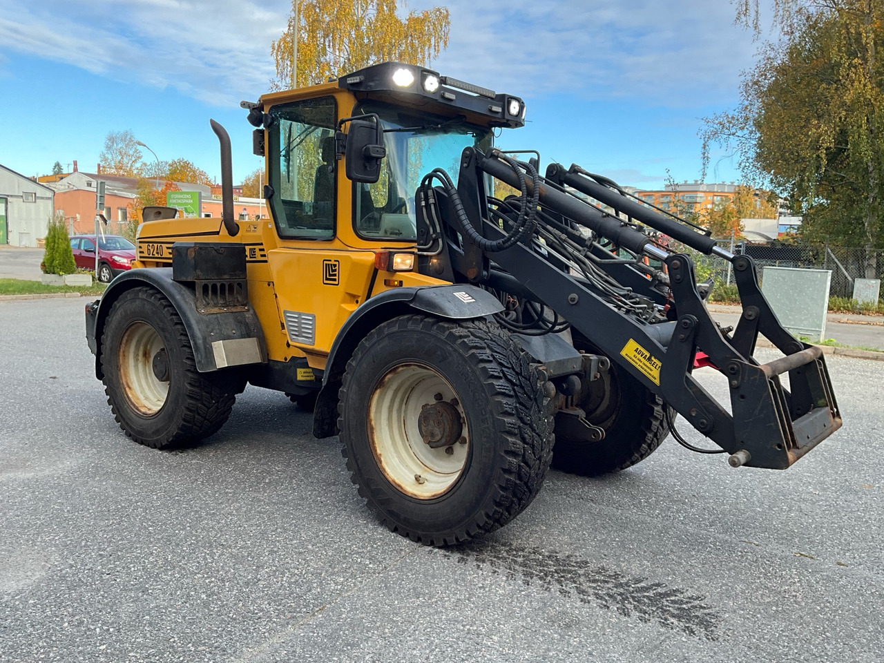 Lundberg 6240 - Máy xúc lật bánh lốp: hình 1 Lundberg 6240 - Máy xúc lật bánh lốp: hình 1