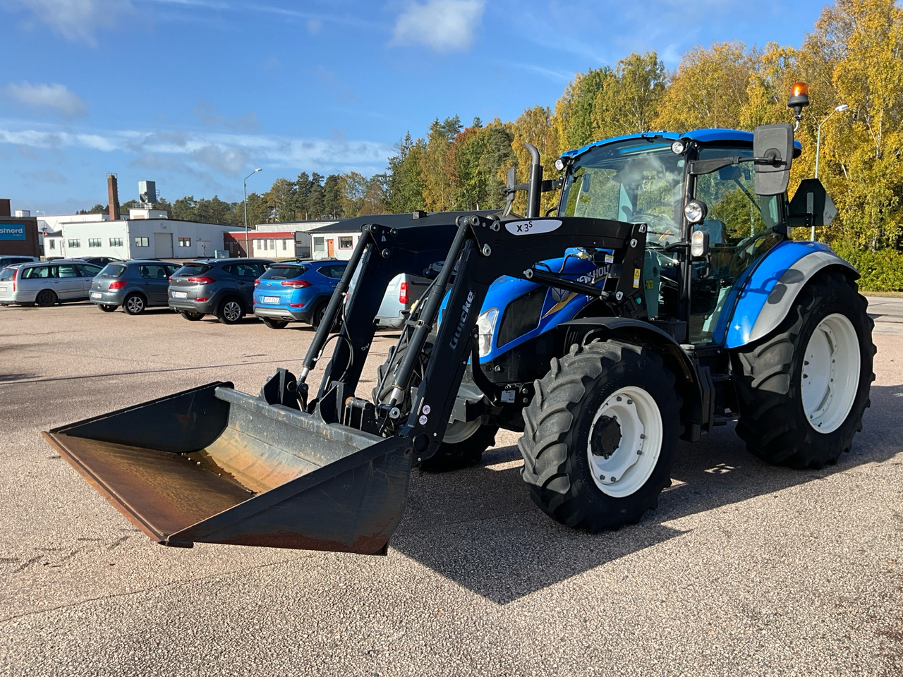 New Holland T5.85 - Máy cày: hình 1 New Holland T5.85 - Máy cày: hình 1