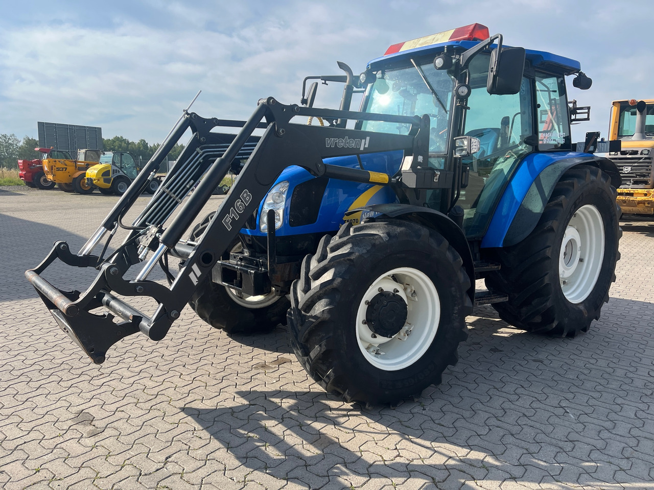 New Holland T5070 - Máy cày: hình 1 New Holland T5070 - Máy cày: hình 1