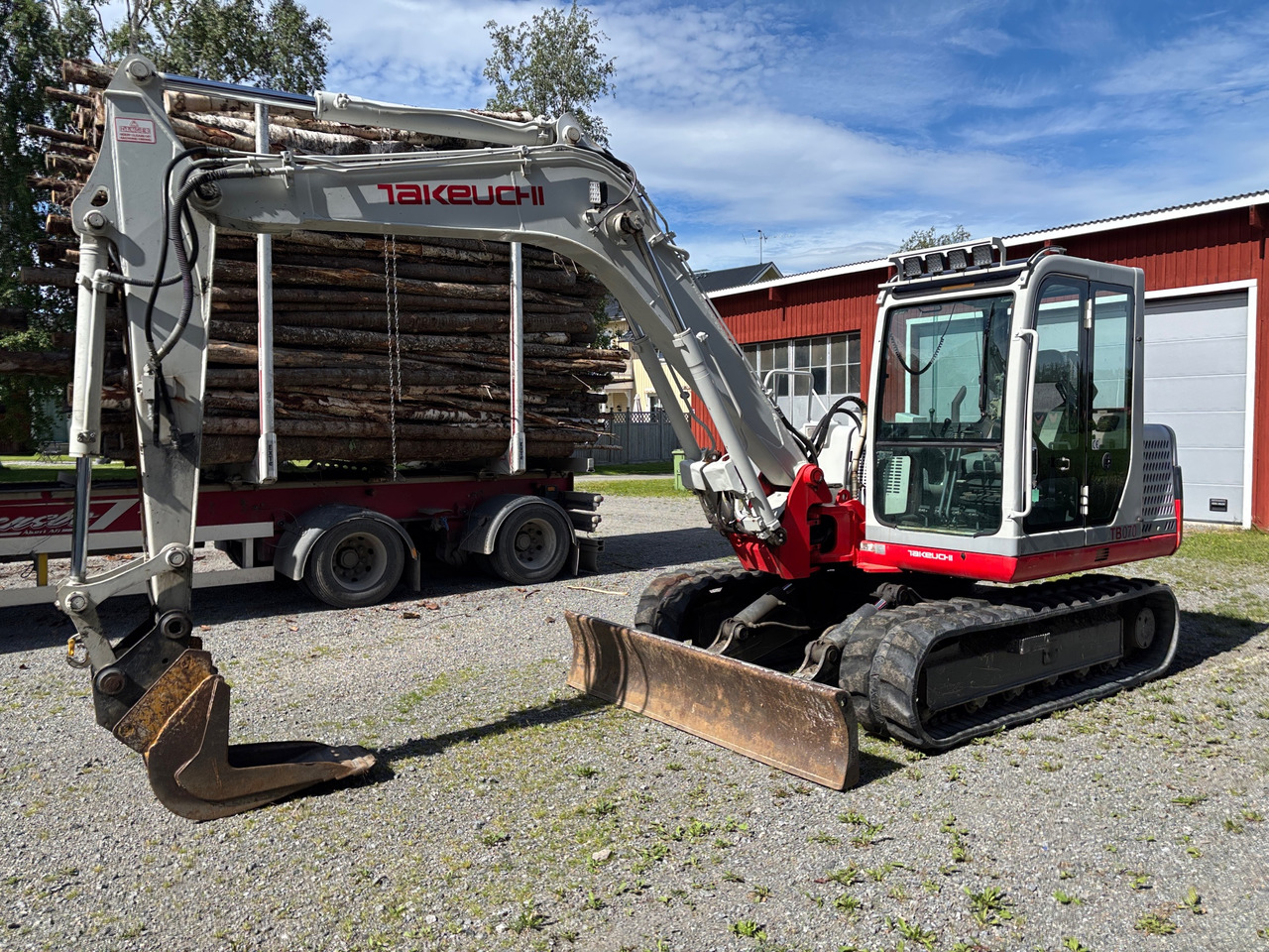 Takeuchi TB070 - Máy xúc: hình 1 Takeuchi TB070 - Máy xúc: hình 1
