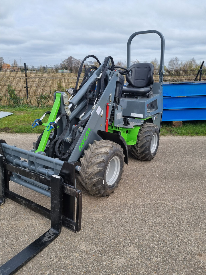 Brede trekker banden - Máy xúc lật bánh lốp: hình 1 Brede trekker banden - Máy xúc lật bánh lốp: hình 1