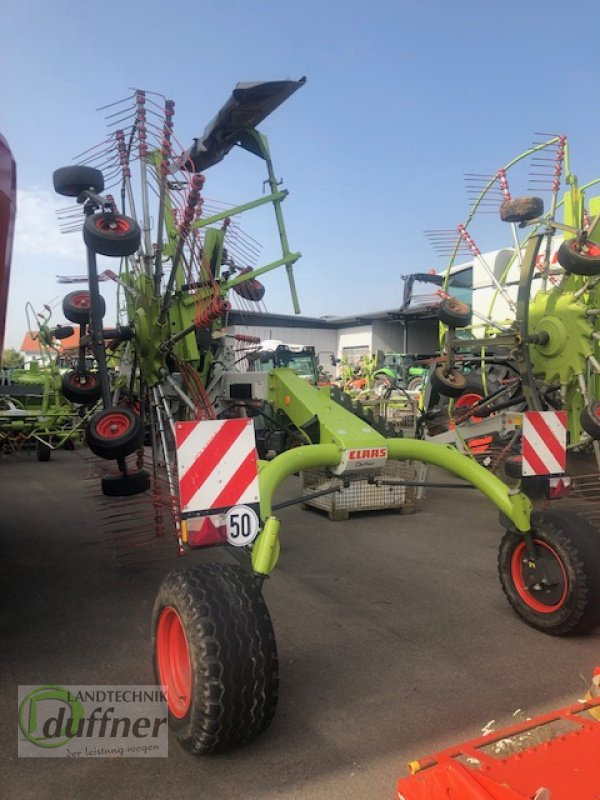 CLAAS Liner 1750 - Dàn trải/ Cào: hình 4 CLAAS Liner 1750 - Dàn trải/ Cào: hình 4