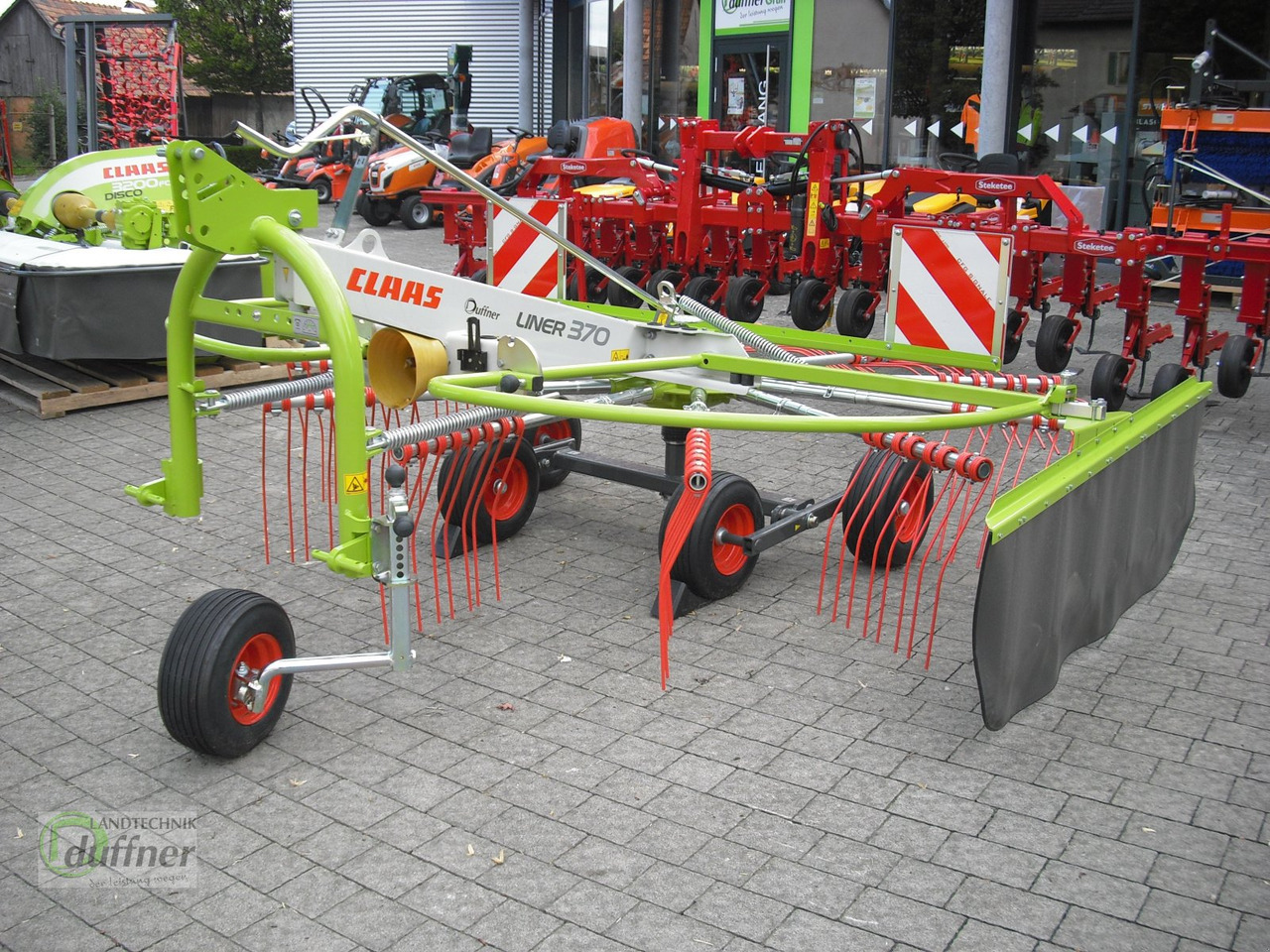 CLAAS Liner 370 - Dàn trải/ Cào: hình 2 CLAAS Liner 370 - Dàn trải/ Cào: hình 2