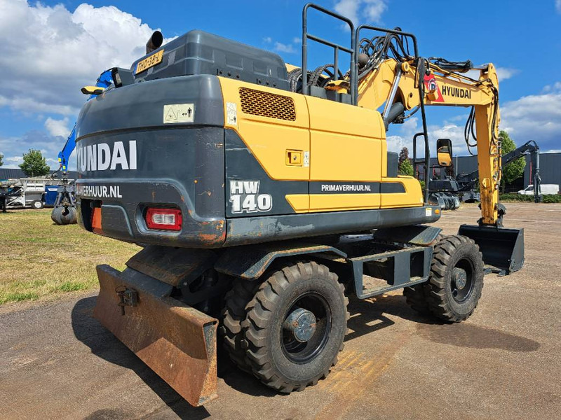 Hyundai HW140 - Máy xúc bánh lốp: hình 3 Hyundai HW140 - Máy xúc bánh lốp: hình 3