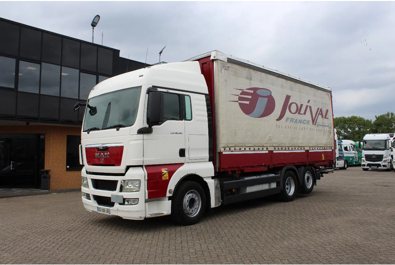 MAN TGX 26.440 * EURO5 * 6X2 * LIFT AXLE * - Xe tải thùng mui bạt: hình 2 MAN TGX 26.440 * EURO5 * 6X2 * LIFT AXLE * - Xe tải thùng mui bạt: hình 2