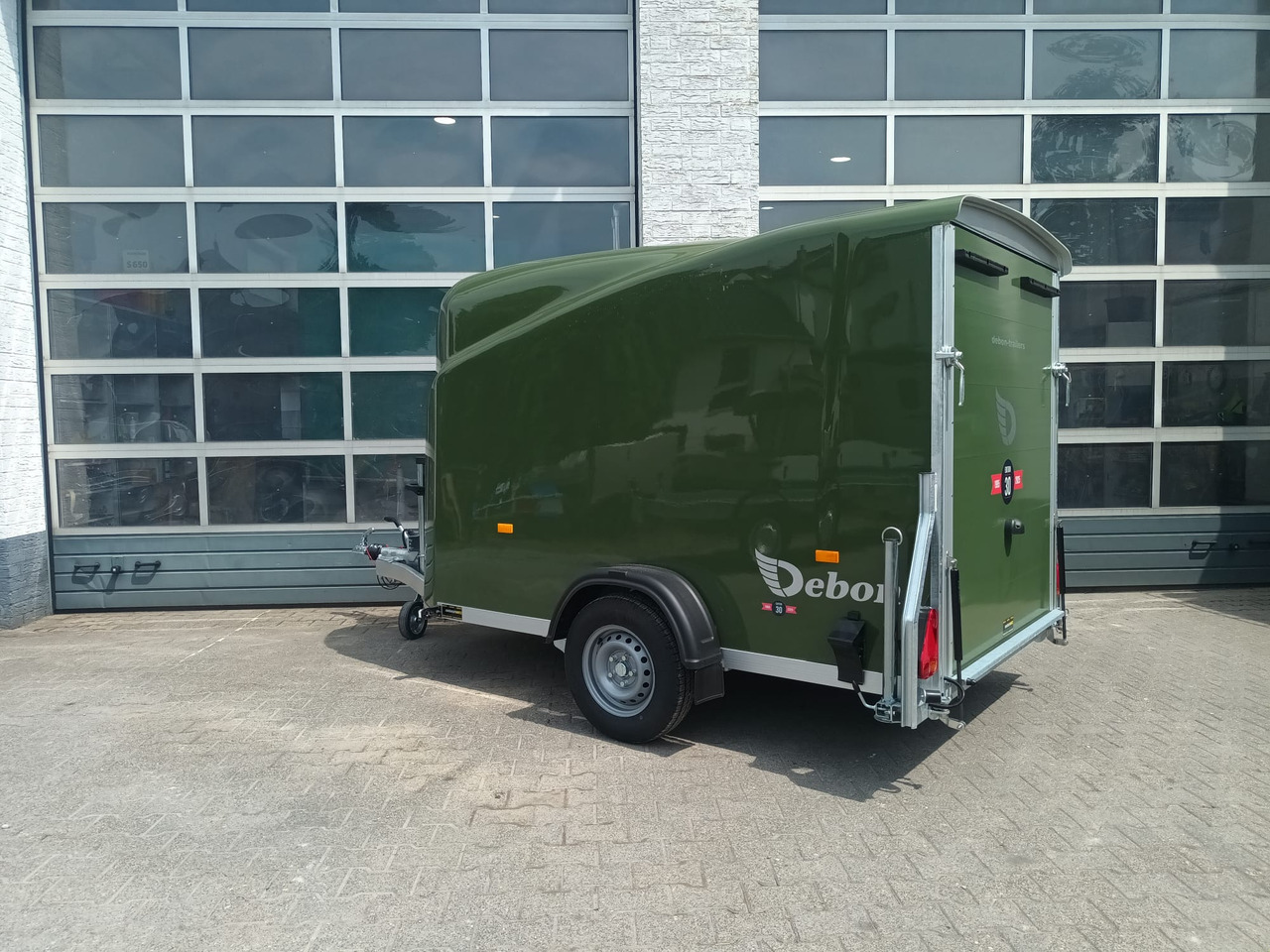 Debon Cargo 1300 300x152x168cm natur green Seitentür Pullman 1300kg 100km/H Juli Aktion 2025 - Rơ moóc xe hơi: hình 5 Debon Cargo 1300 300x152x168cm natur green Seitentür Pullman 1300kg 100km/H Juli Aktion 2025 - Rơ moóc xe hơi: hình 5