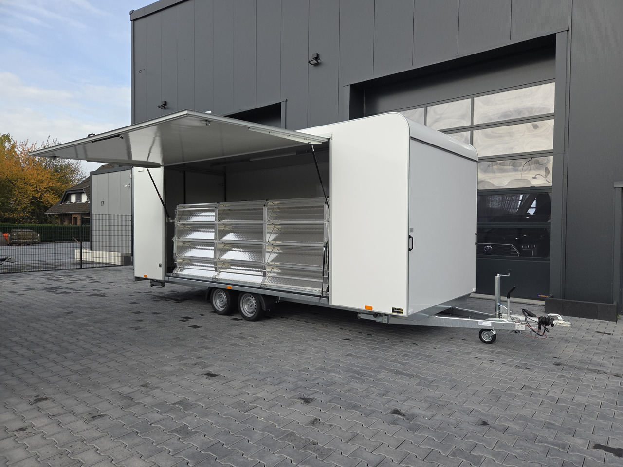 Event Trailer Koffer TWSP M 600T.01 600x230x210 Seitenklappe Treppe Hecktüren 230V 3000kg - Rơ moóc bán hàng: hình 4 Event Trailer Koffer TWSP M 600T.01 600x230x210 Seitenklappe Treppe Hecktüren 230V 3000kg - Rơ moóc bán hàng: hình 4