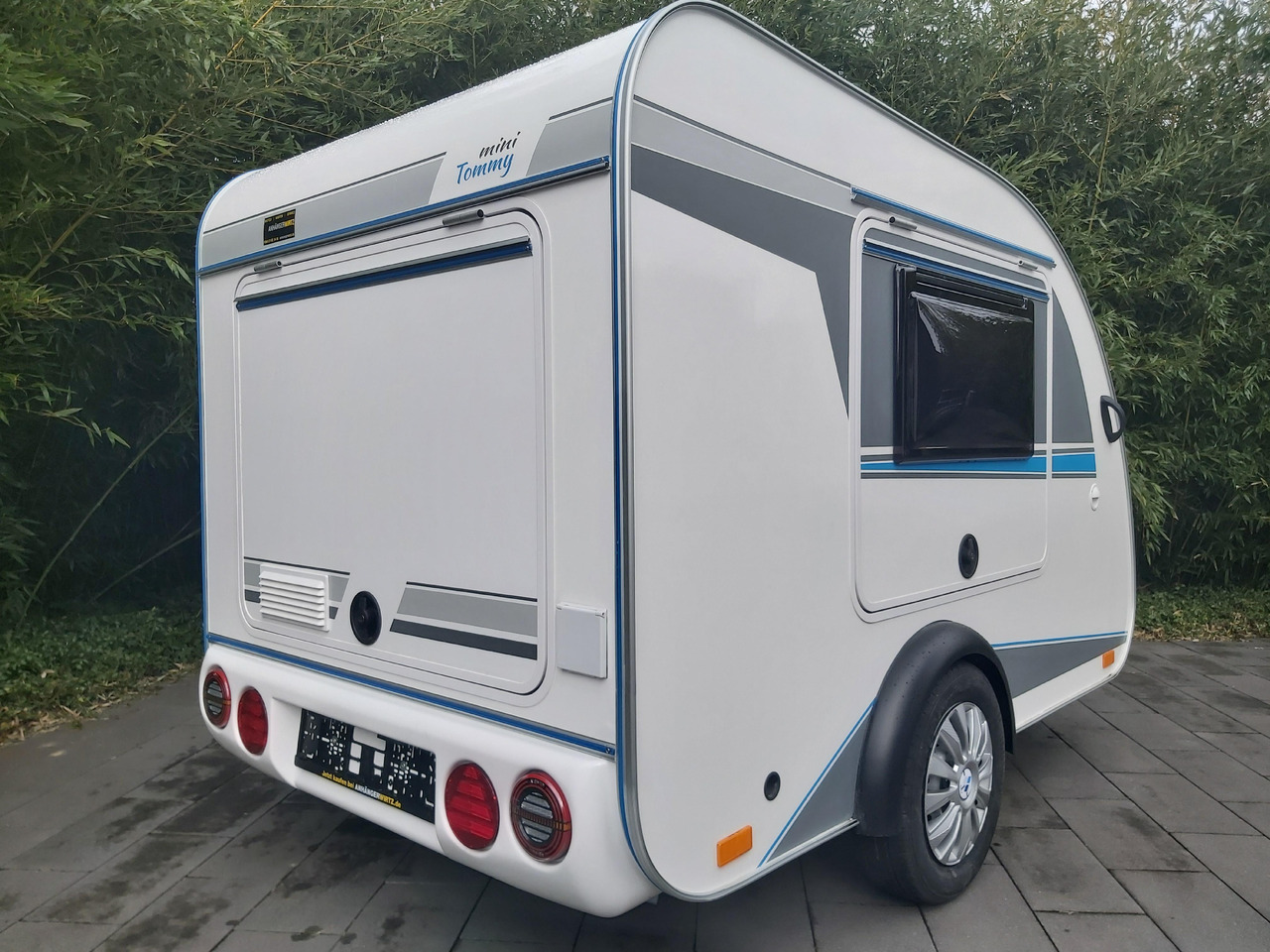 Mini Camper Mini Tommy TMC25 252x140x121cm aero V1 Küche 12V/230V 100km/H 750kg gebremst Modell 24 - Rơ moóc kiểu caravan: hình 5 Mini Camper Mini Tommy TMC25 252x140x121cm aero V1 Küche 12V/230V 100km/H 750kg gebremst Modell 24 - Rơ moóc kiểu caravan: hình 5