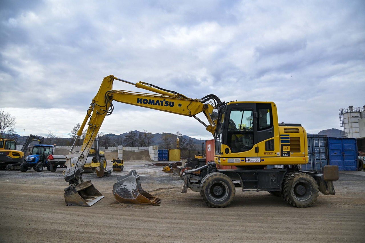 KOMATSU PW148-10 - Máy xúc bánh lốp: hình 2 KOMATSU PW148-10 - Máy xúc bánh lốp: hình 2